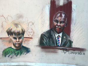 Gerald Malloy glances at the defendant, Dylann Roof