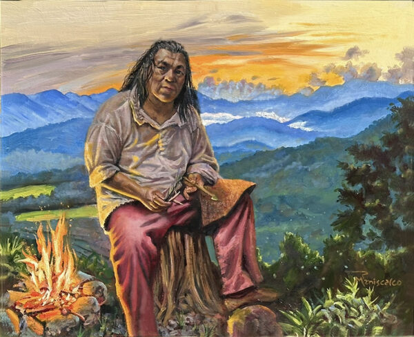 This Land is Your Land 20×24″ oil on panel, framed by the artist Everywhere I go, I am looking for inspiration. A few weeks back, we were able to stay in a home on a creek in the Great Smoky Mountains. The painting depicts a native American member of the Eastern Band of the Cherokee Nation, in western North Carolina. We had a chance to visit the Oconaluftee Indian Village, where the 18th-century Cherokee lifestyle is preserved via live tool and craft demonstrations and authentic buildings. This gentleman was creating arrows for hunting the traditional way. And on the way back from Dry Falls, I captured this beautiful vista of the Smoky mountains at dusk, combining them to create this image of the craftsman, a reminder of who this land really belongs to. The light from the fire appears as war paint on his curious face. There is no judgment but there is a knowledge in his face that his people were on this land centuries before European colonists took it and made it their own land with their superior weaponry and patriotic songs